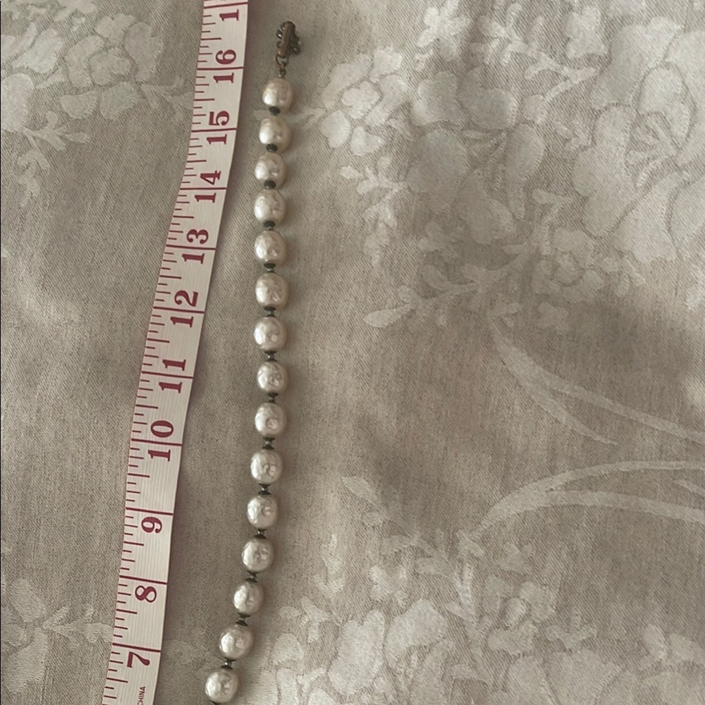 Elegant Miriam Haskell faux pearl necklace signed on the clasp.